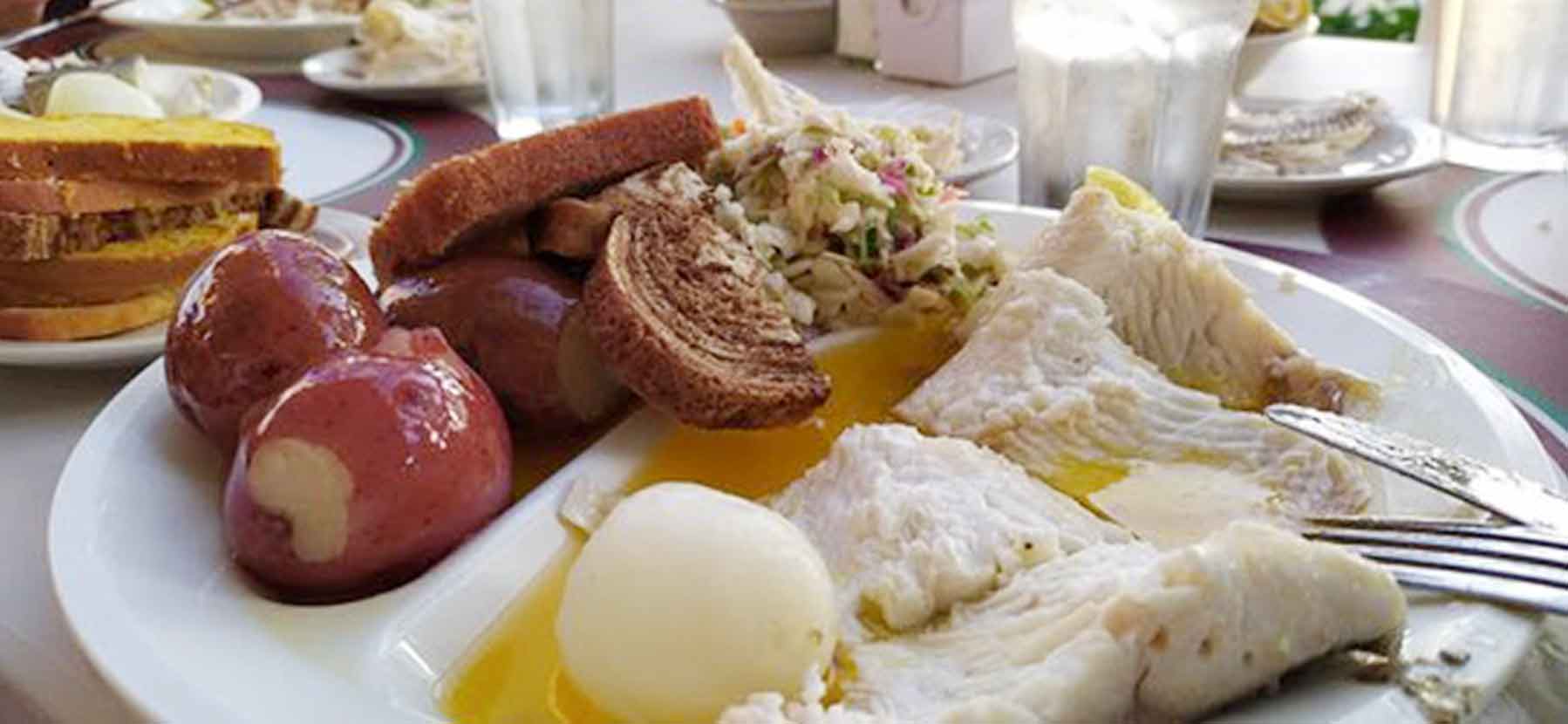door county fish boil plate with steaming buttery fish